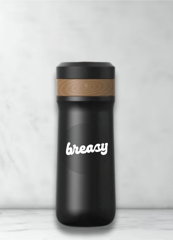 Breasy travel mug with built-in French press
